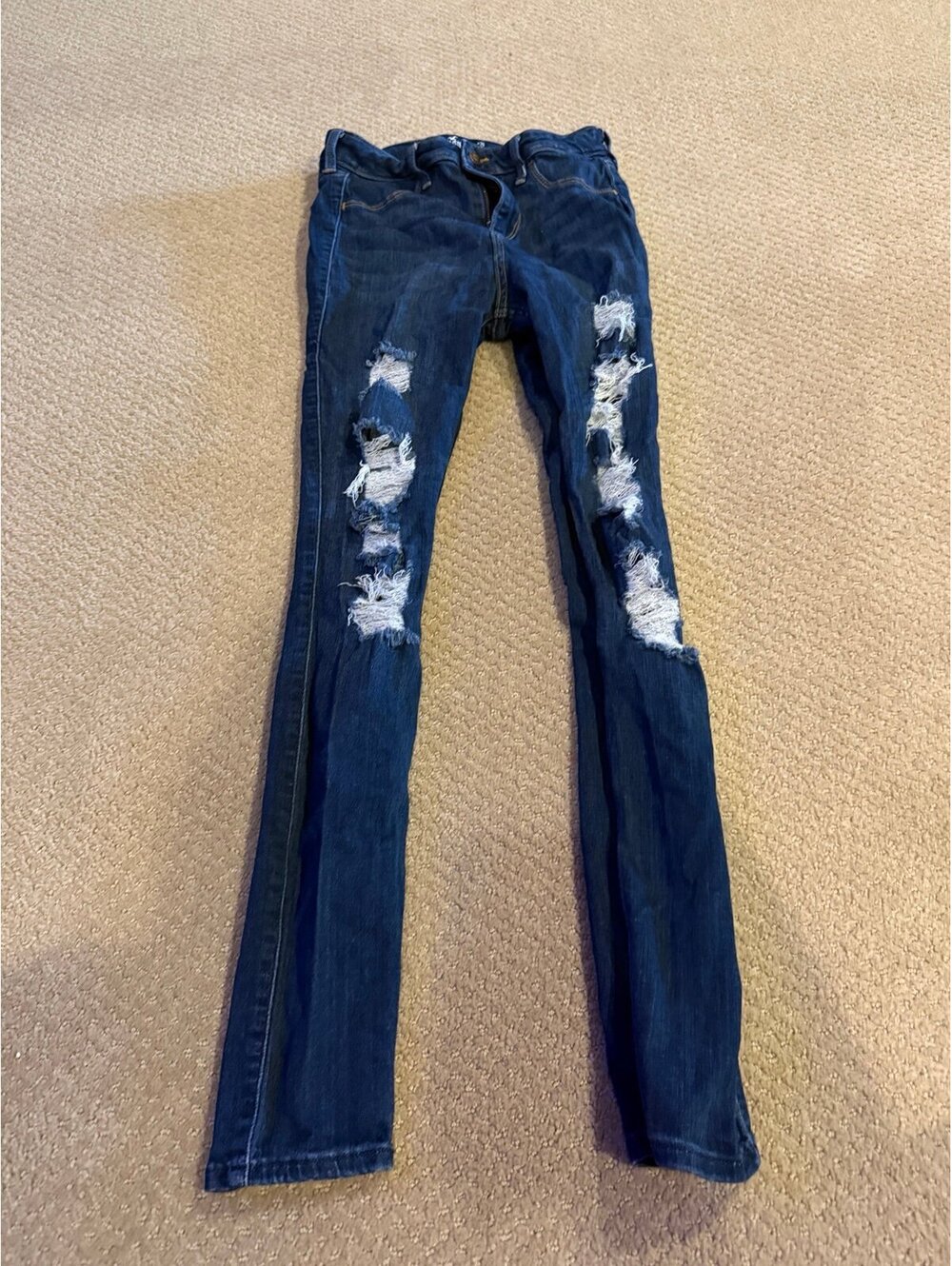 Hollister size 7L jeans with holes
